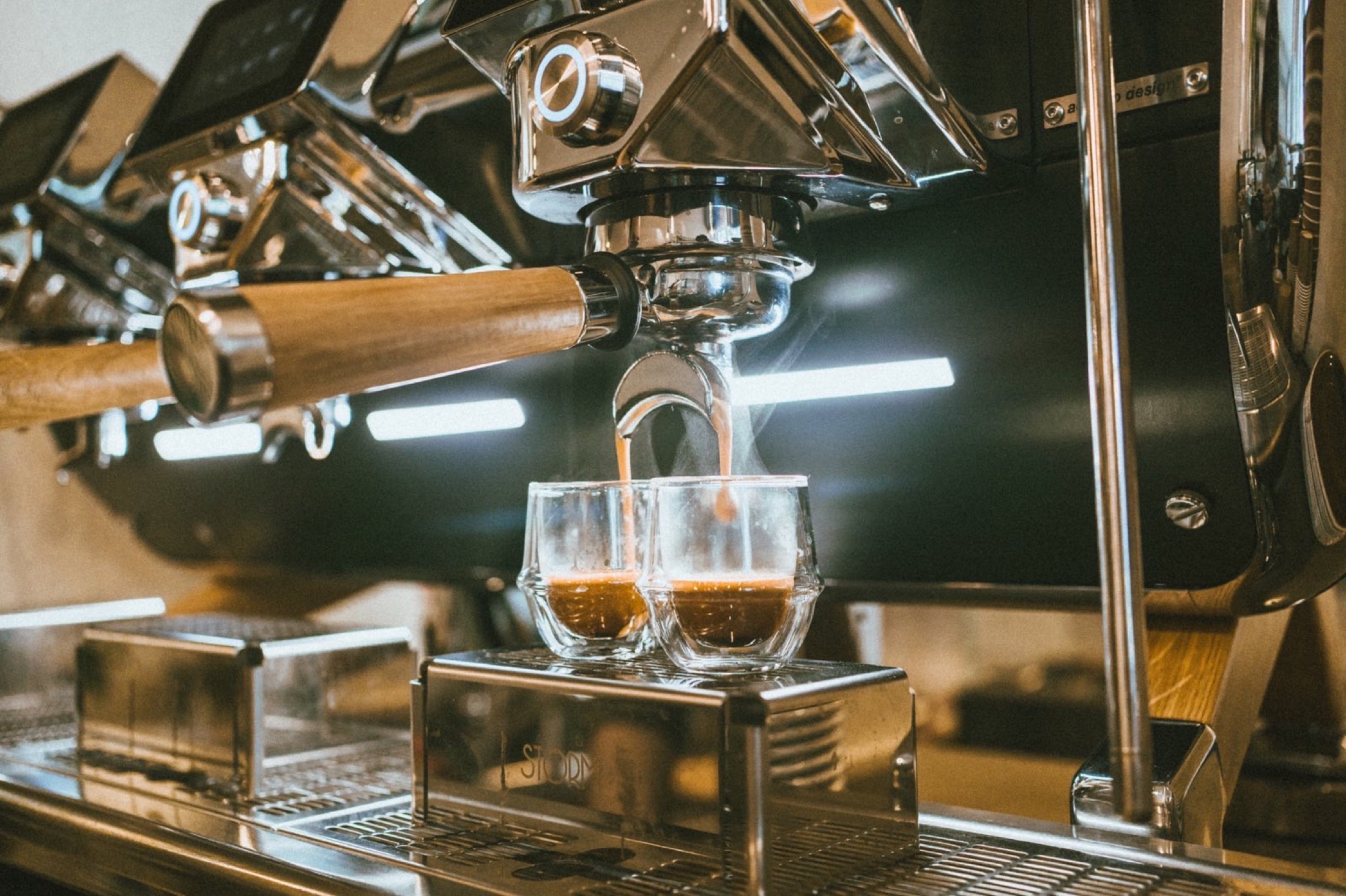 The coffee machine at Market By Jeremy preparing two espressos